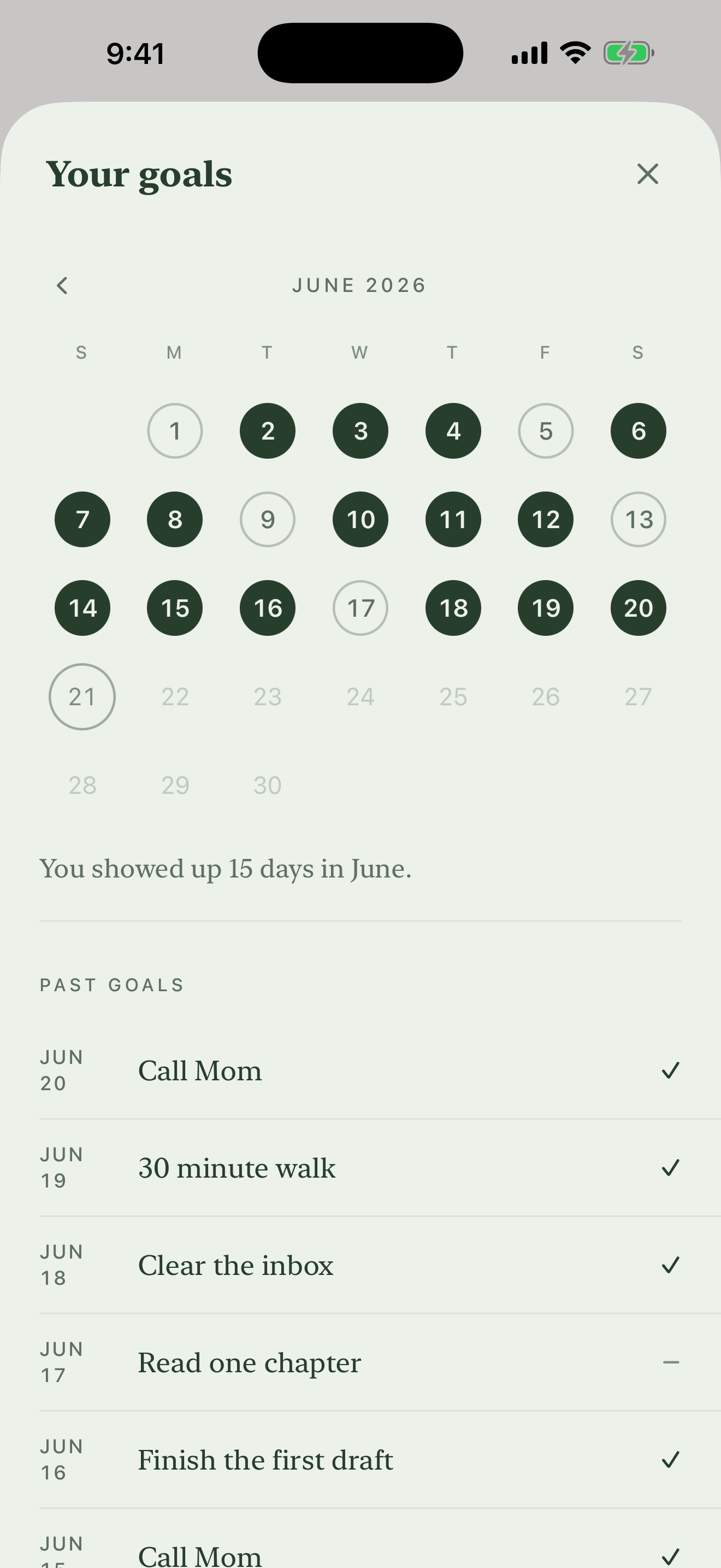 A month calendar showing the days a goal was completed, plus a list of past goals